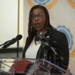 Maxine Seymour, Colina’s Communications Director, speaks during the press conference.