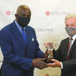 Branch Persistency Award (l to r): Bernard Hanna, Admiral Sales Representative, accepting the Branch Persistency Award for the Admiral Branch from Philip Smallwood, Director of Sales, Agency Services.