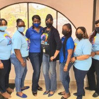 The Golden Eagles of 21 Collins rock blue for autism. (l to r): Wayne Miller, Sales Representative; Desiree Wells, Marketing Assistant; Sandra Smith, Sales Representative; Mary Beneby, Marketing Assistant; Bridgette Sands, Sales Manager, Collins Branch; Theresa Carroll, Marketing Assistant; Sandra Walkes, Assistant Branch Manager, Collins Branch; Georgette McKenzie, Sales Representative; Kino McCartney, Branch Manager, Collins Branch, Colina Insurance Limited.