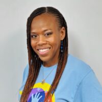 All about blue. Chantal A. Horton, Communications Officer, in her REACH shirt.