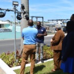 Chad Gibson, CEO, Hype Lightz explains the lighting process to representatives from R.E.A.C.H. and Colina.