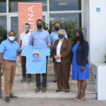 Colina employees purchased shirts to wear each Friday in April to bring awareness to autism, a
complex, lifelong developmental disability. (l to r) Dwayne Gibson, Chairman, Board of
Directors, R.E.A.C.H.; Obasi Bosland; Marcus Bosland, Resident Actuary, Colina; Leotha Nixon,
Manager, Human Resources; Marcia Newball, Board Member, R.E.A.C.H. and Maxine Seymour,
Director, Corporate Communications, Colina.
