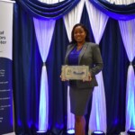 Giorgina Duncanson-Thompson, Chief Group Internal Auditor, Colina Holdings Bahamas Limited displays her Distinguished Chief Auditor Executive Award