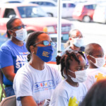 Attendees listen to remarks at the event.