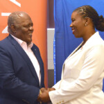 Rt. Hon. Hubert Ingraham, Former Prime Minister and Maxine V. Seymour, Director, Corporate Communications, Colina shared a laugh during the book presentation ceremony.