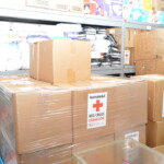 Bahamas Red Cross boxes containing supplies for individuals in need.