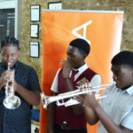 Winners of The Nassau Music Society trumpet competition play a selection on the new instruments they received as prizes.