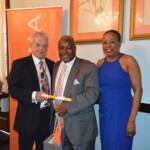 Alexander Pratt happily accepts his award from Philip Smallwood, Director of Sales (l) and Yvonne Gibson-Sands, Sales Manager (r).