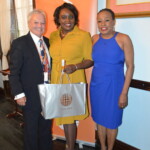 Anatole Bullard (center) accepts her award from Philip Smallwood, Director of Sales and Yvonne Gibson-Sands, Sales Manager.