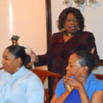 Clothie Lockhart, Sales Training Manager congratulates GFSP designation recipients on the successful completion of their program