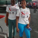 (l to r) Colina employees Darneisha Ferguson and Davinia Allen pose for a photo after successfully completing A Sunset Move.