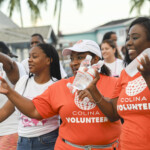 Colina volunteers proudly supporting the cause. Colina Insurance Limited donated water for the event.