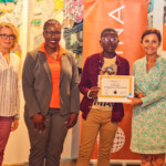 (l to r) Dr Christine Gangelhoff, Artistic Director, Nassau Music Society and Music Professor, University of The Bahamas; Maxine V. Seymour, Director, Corporate Communications, Colina; With-Mael Alcide, Overall Drum Off Winner – Judges' Choice; Cynthia Van Wynen, President and Executive Director, Nassau Music Society