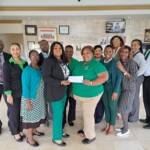Sandradee Henfield, Branch Manager, Northern Region and Freeport Colina team members present Jamila Carroll-Thompson, Education & Communication Coordinator, The Kidney Centre with a cheque in support of Kidney Awareness month.