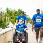 D’Andra A. Johnson, Legal Counsel & Corporate Secretary and Leonardo Ferguson, Chief Group Internal Auditor share a smile as they stroll the scenic Pushathon route.