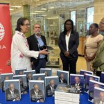 (l to r) Maria Teresa Butler, Executive Editor, Book Project Team Leader; Neko Meicholas, Owner, Guanima Press Ltd; Maxine Seymour, Director, Corporate Communications, Colina; DeAndrea Lewis, Vice President, Life Operations and Patricia Glinton-Meicholas discuss benefits of the expansion of the body of work for library’s patrons.