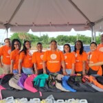 Branch Manager Sandradee Henfield, at the center, with the dedicated team at Colina.