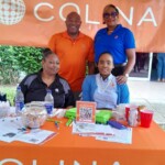 Colina staff engaging with UB student