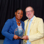 Michelle proudly collected her award from Chief Executive Officer, Emanuel Alexiou.