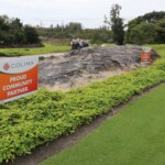 Colina feather flags and lawn signs adorned the golf course.