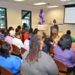 The dynamic ladies of Colina were all ears listening to tips on financial empowerment.