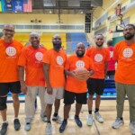 After several nail-biting games, the basketball team was happy to smile for the camera.