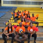 The bleachers were painted orange with Team Colina cheering on their athletes