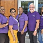 Team Colina at 56 Collins Avenue were all smiles as they POP’d in their purple.