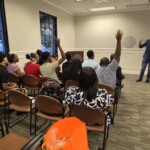 The students were eager to ask Brandon Deyalsingh about the world of actuarial science.