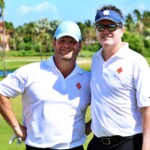 Chris and Jeremy tee off the day with smiles to match their swing.