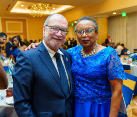 BIA Honouree and Colina CEO Emanuel M. Alexiou and Rhonda Chipman Johnson, Coordinator, BIA.