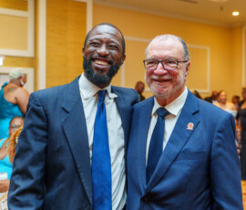 (l to r) Ramon Gregory Bonamy, son of the late Greg Bonamy, Colina Sales Representative, and Emanuel M. Alexiou BIA Honouree and Colina CEO.