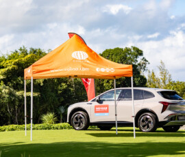 The pop of orange along the pastures added to the golfer’s scenery.