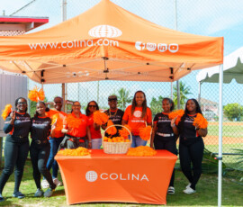Team Colina shares a smile with some of the Colina Distributors.