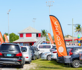 Colina banners mark the grounds as teams and supporters gather for the day’s festivities.