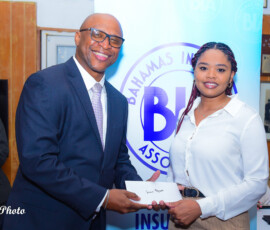 (l to r) Richard Darville, Deputy Chair, Property and Casual, BIA and Serena Maycock, Cashier.