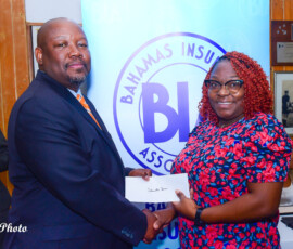 (l to r) Julian Rolle, BIA Chairman and Sametri Dean, Premium Accountant.