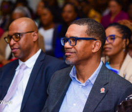 Marcus Bosland, Chief Operating Officer and Deputy Chair (Life and Health), BIA looks on as Colina colleagues receive awards for the hard work and dedication.