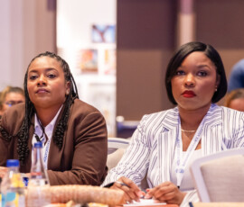 Nyoshi Ward, Payments Manager and LaTaj Henfield, Group and Health’s Marketing Administrator, listen intently to the knowledge being shared.