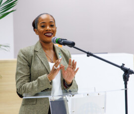 Dana Munnings-Gray, superintended of insurance at the Insuance Commision of The Bahamas congratulates Colina on the opening of their new branch.