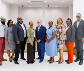 From l to r: Frank Ellis, facilities manager; Nyoshi Ward, payments manager; Rodney D. Bain Jr., deputy superintendent of insurance at the Insurance Commission of The Bahamas; Dana Munnings-Gray, superintendent of insurance; DeAndrea Lewis, vice president of life operations and sales; Lavaugn Fernander; customer service manager; Maxine V. Seymour, director of communications; and Marcos Bosland, chief operations officer.